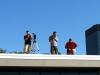 GiveCamp photographers on roof getting ready to take group photo