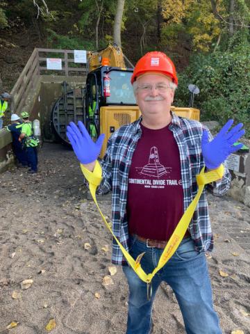 Wearing safety gear after sewer tour. Note that I am wearing my Continental Divide Trail shirt.