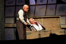 Tom Ford (left, as Sweeney Todd) dispatches his first victim, actor Mark G. Hawbecker (right, as Adolfo Pirelli)