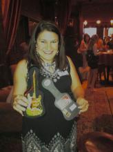 Crystal @EatDrinkClev won mini guitar prize!