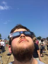 Kevin Smith with his eclipse glasses