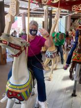 Saturday, May 1, 2021 - Julie rides the Grand Carousel at Knoebels Amusement Resort