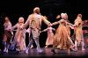 Mr. Fezziwig (actor Darryl Lewis, center) makes merry with his party guests in Great Lakes Theater's 25th anniversary production of Charles Dickens' holiday classic "A Christmas Carol" at the Ohio Theatre, PlayhouseSquare. (Photography by Roger Mastroianni)